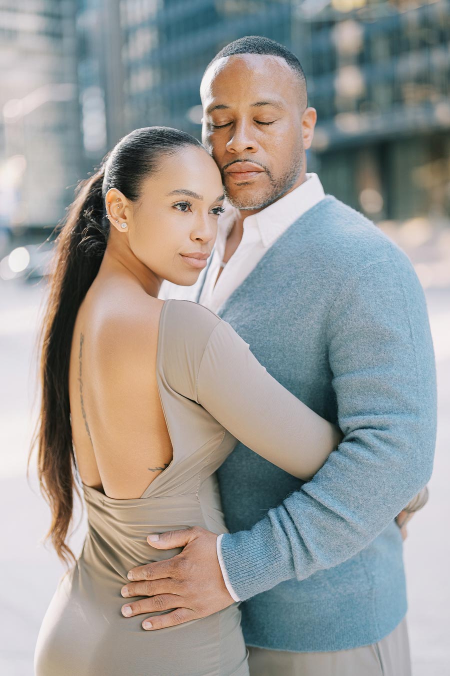 DeVon Franklin and Maria Castillo during their downtown Toronto engagement photoshoot with skyline views and romantic city backdrops