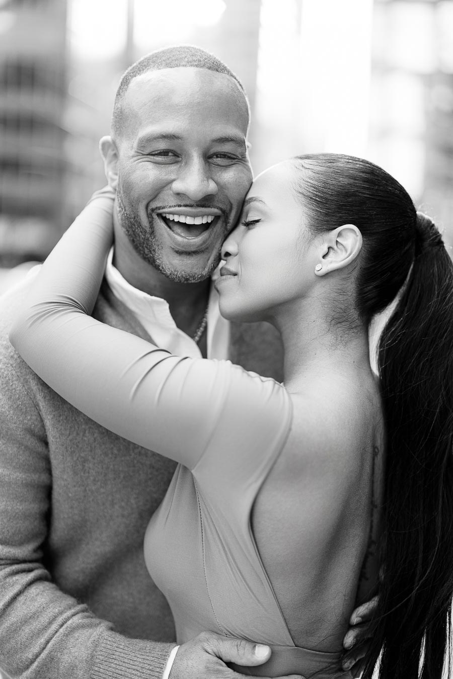 Romantic Downtown Toronto Engagement Photoshoot with Candid Moment