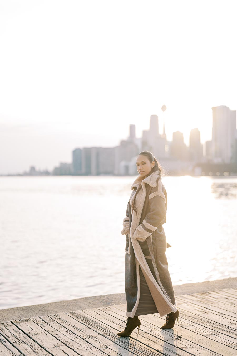 Sunset waterfront engagement photo in Toronto with skyline view