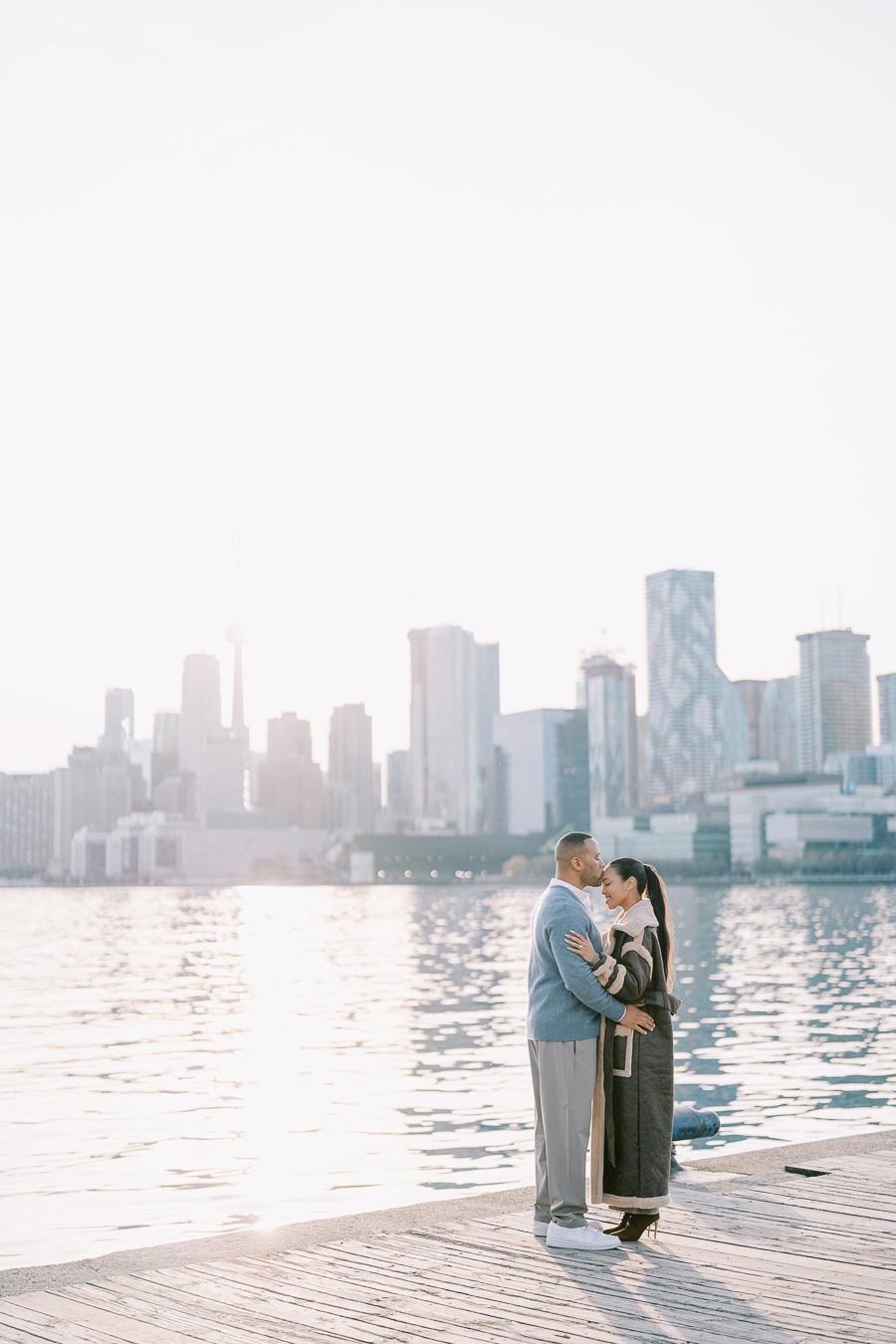 Sunset Kiss on Polson Pier During Toronto Engagement Session