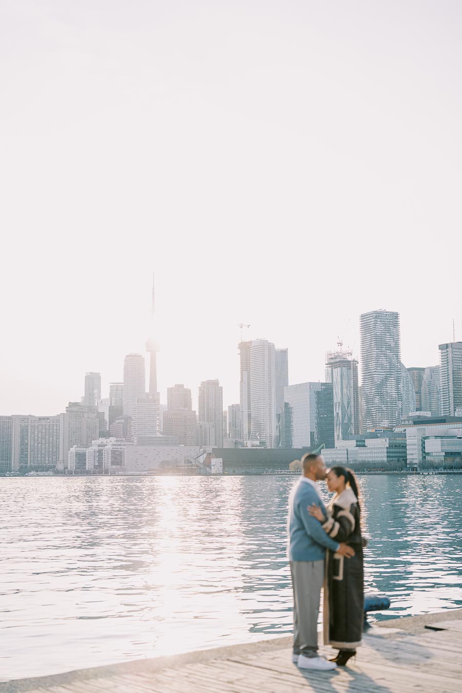 Sunset Kiss on Polson Pier During Toronto Engagement Session