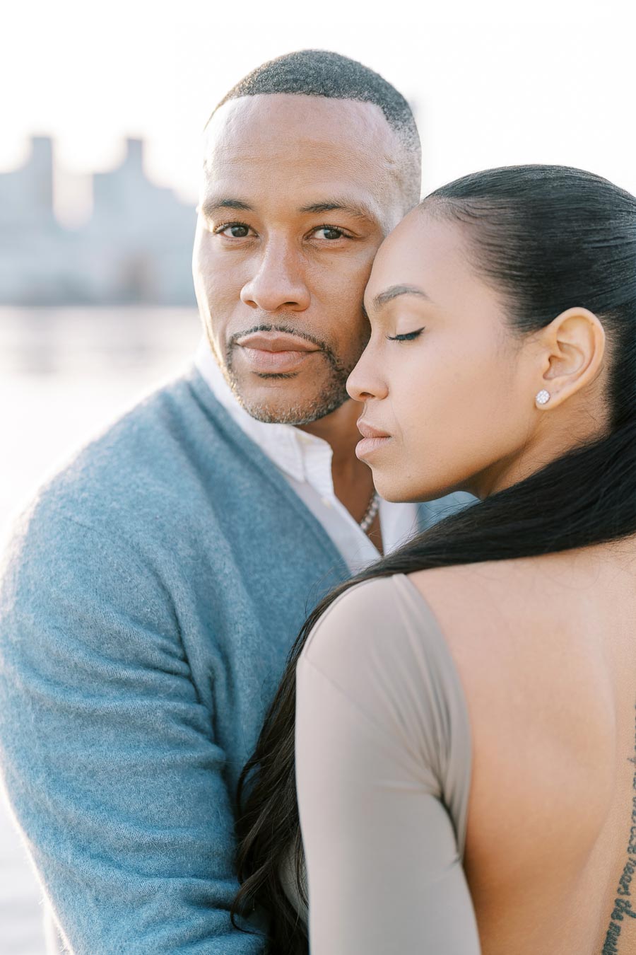 DeVon Franklin and Maria Castillo embracing during their Toronto engagement session