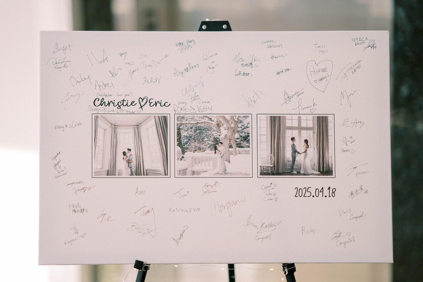 Wedding guest signature board with photos of the bride and groom, Christie and Eric, featuring handwritten messages and signatures from guests, dated April 18, 2025.