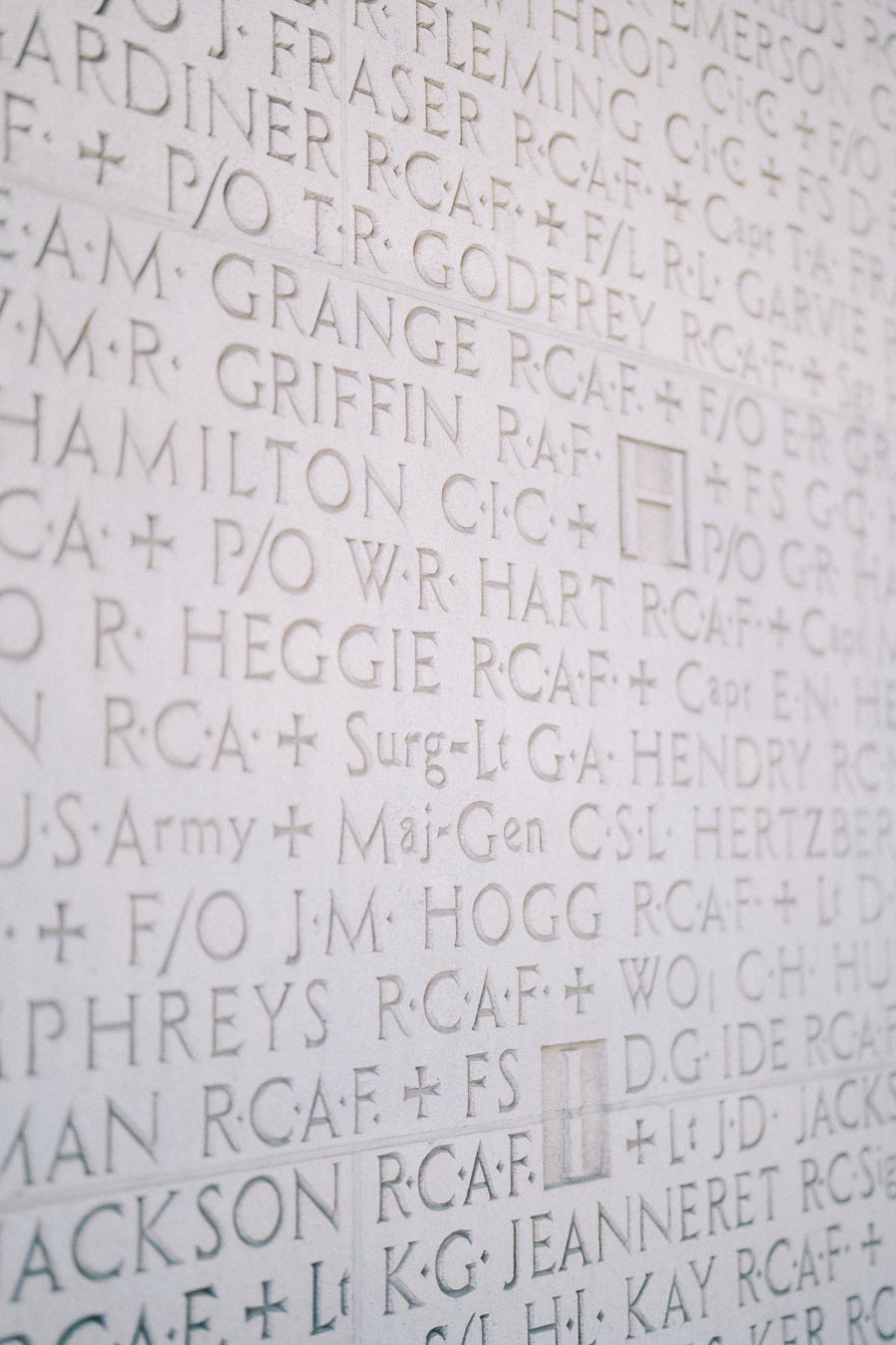 Close-up of engraved stone memorial wall at Hart House, University of Toronto