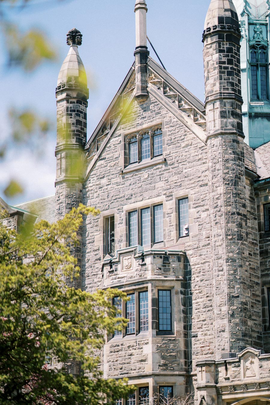 Historic stone building at Trinity College, University of Toronto, photographed in spring