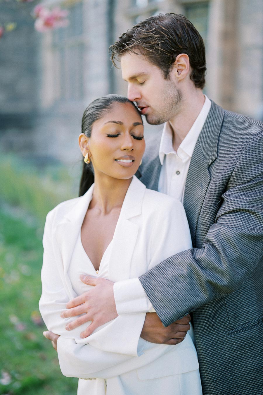 Close-up of engaged couple embracing during spring engagement session at University of Toronto