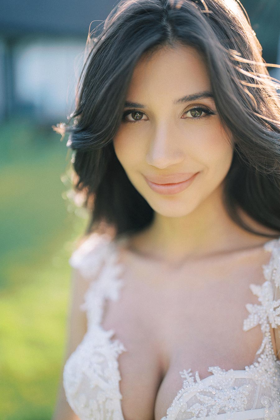 Bride smiling during golden hour at Erin Estate wedding photoshoot near Toronto