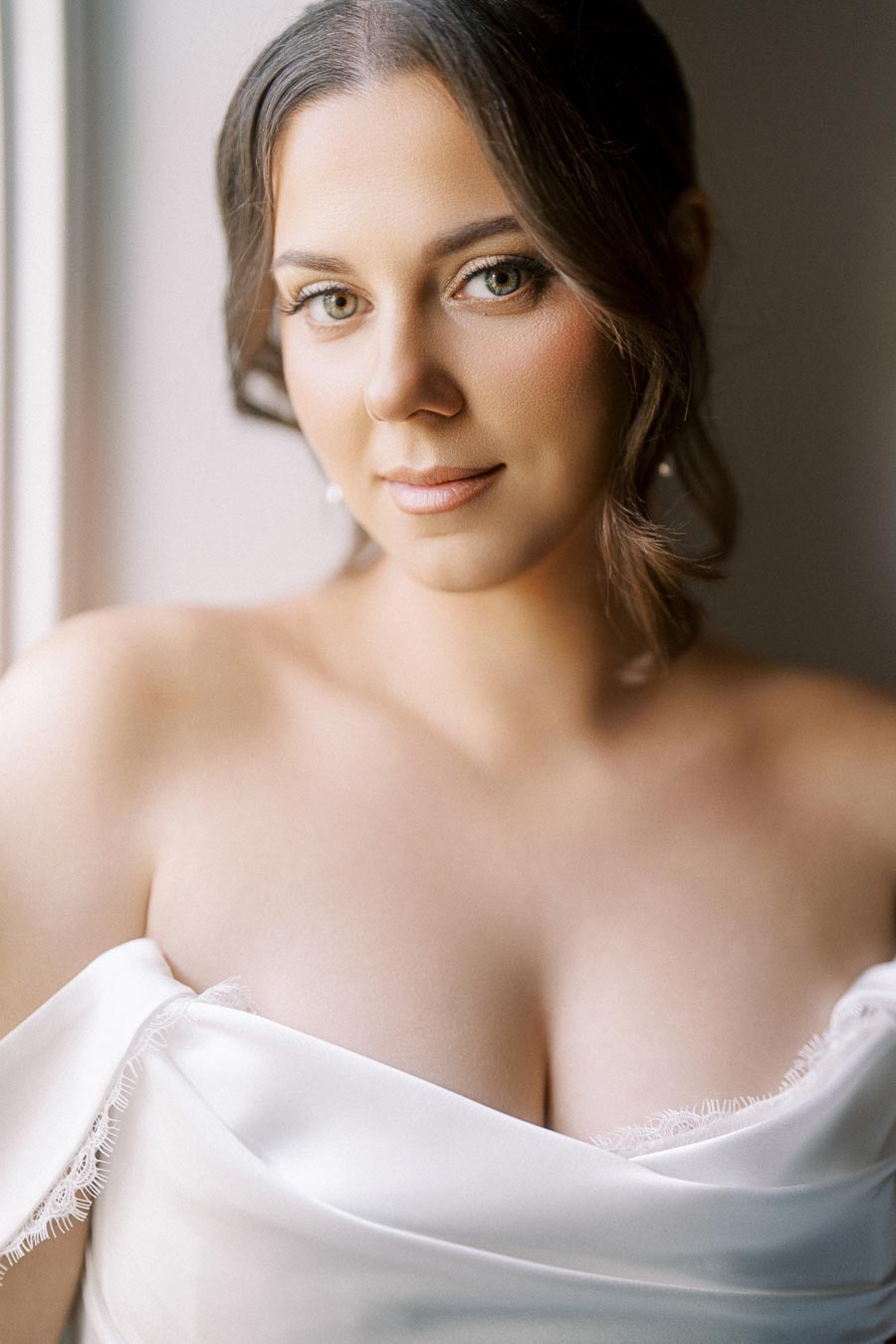 Alexandra and Pavel’s wedding day in Niagara-on-the-Lake, Ontario, featuring getting ready and a first look at Toad Hall Cottages and a heartfelt orchard ceremony and reception at Ironwood Cider House. Documentary, editorial wedding photography by a Toronto Wedding Photographer.