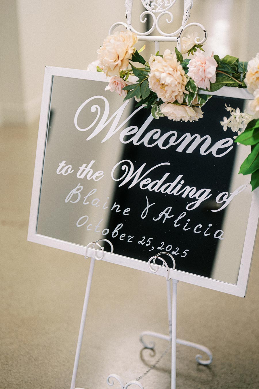 Elegant wedding welcome sign with floral decorations for the wedding of Blaine and Alicia, dated October 25, 2025.