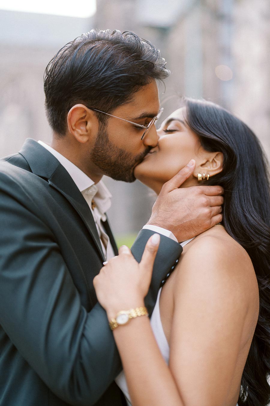 A close-up of Tej and Priyana kissing during their engagement session at the University of Toronto St. George campus.