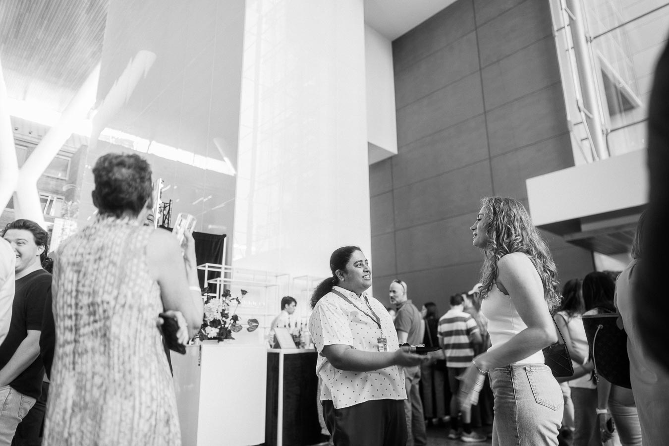 Guests chatting and mingling at the Toronto Prep Forever Launch Party inside The Atrium at Ricarda’s, with modern architectural details visible.