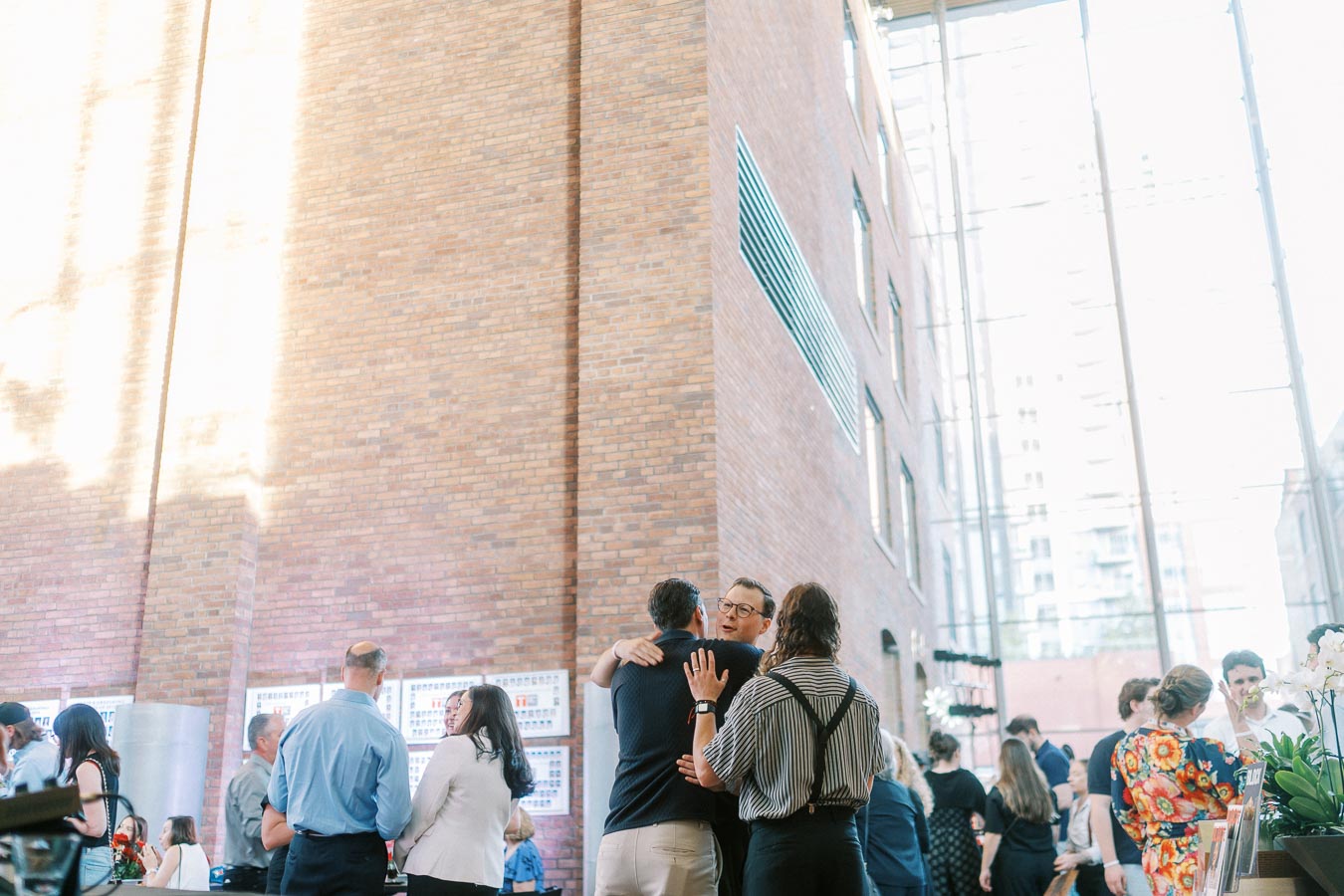 Guests interact and socialize in the modern brick atrium of Ricarda’s Toronto during the Toronto Prep Forever Launch Party event.
