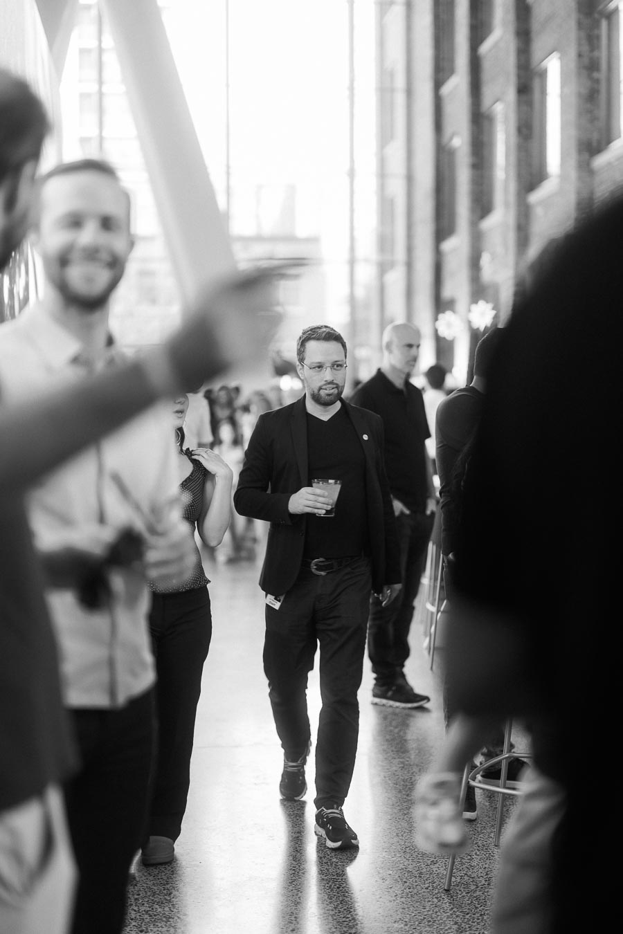 Guests socializing and walking through the modern atrium space at Ricarda’s during the Toronto Prep Forever Launch Party in Toronto.