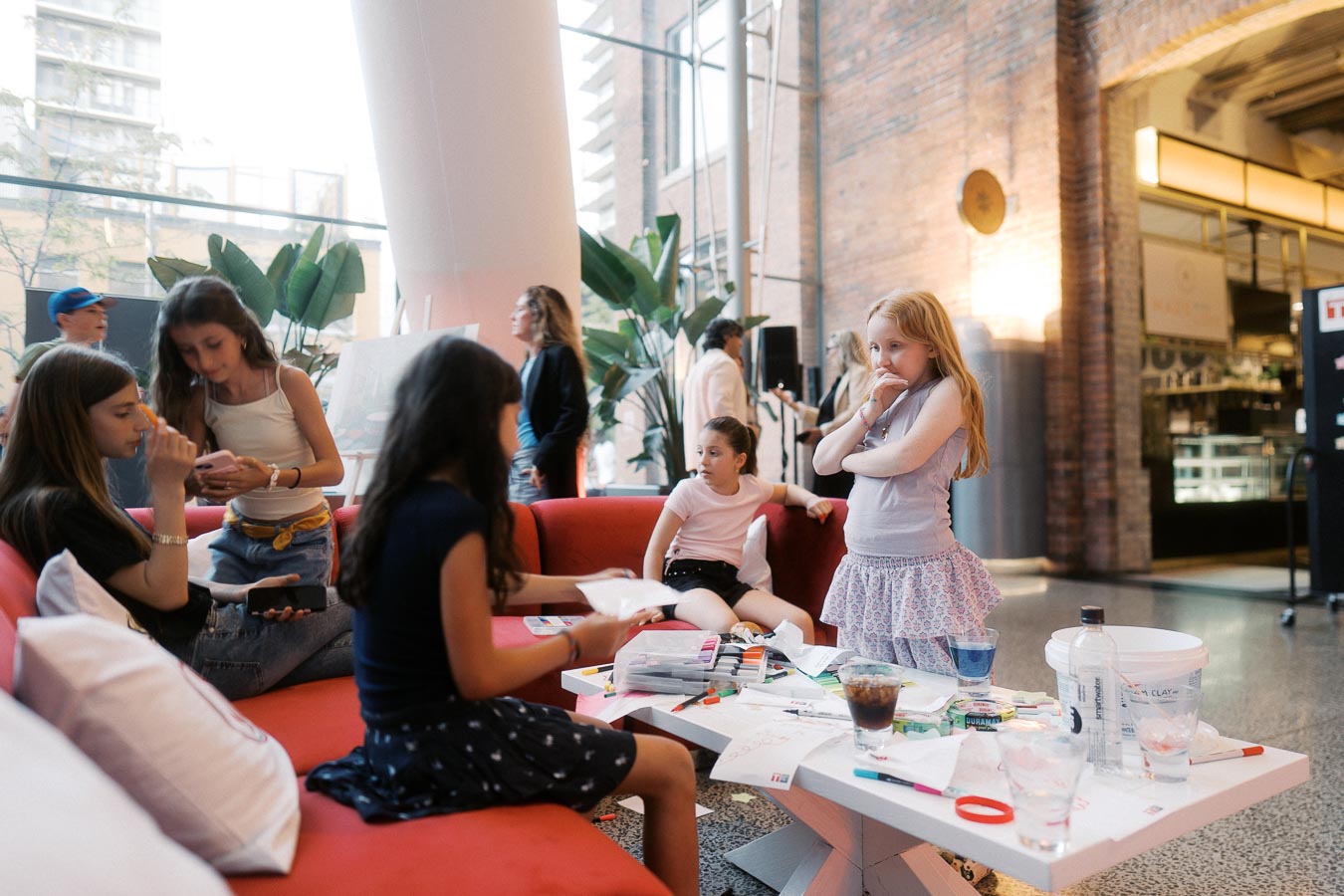 Children participating in crafts and activities at the Toronto Prep Forever Launch Party kids’ lounge, inside Ricarda’s modern atrium event space in Toronto.