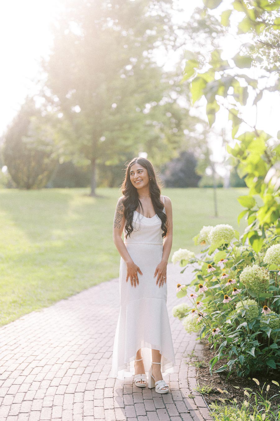 Sumbul standing on a garden path at Dundurn Castle in Hamilton