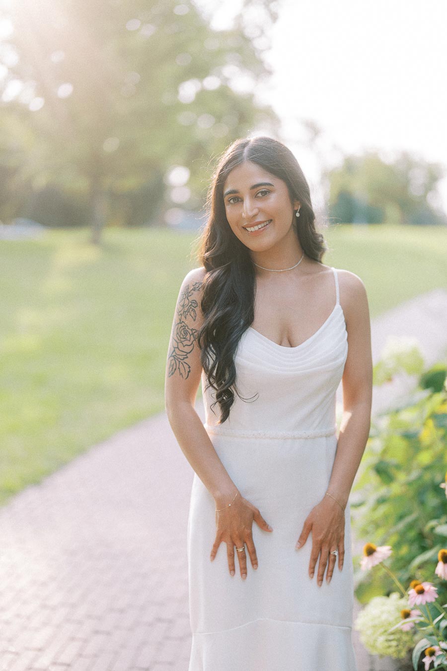 Bride-to-be in white dress during Dundurn Castle engagement portraits