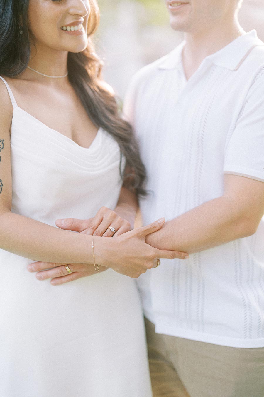 Close-up of Sumbul and Brian holding hands during Hamilton engagement photography