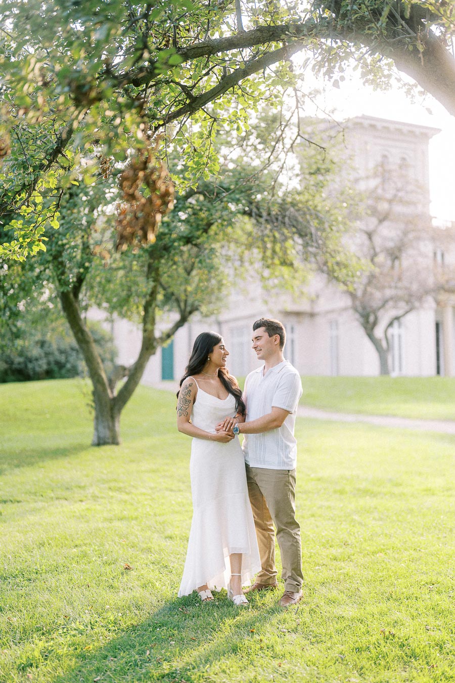 Sumbul and Brian standing together on Dundurn Castle lawns in Hamilton