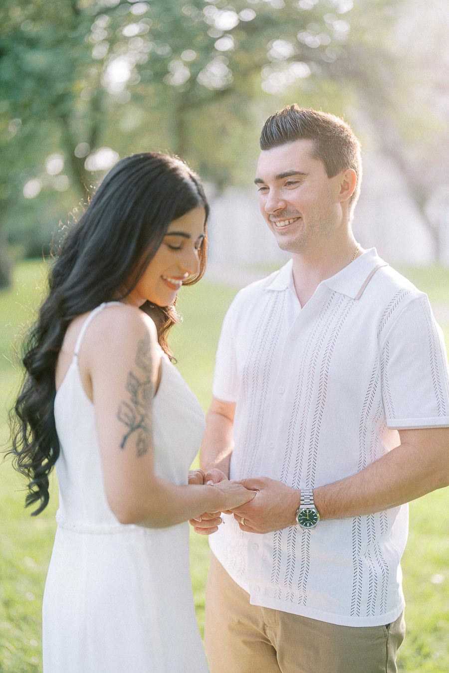Couple holding hands during a Dundurn Castle engagement photoshoot