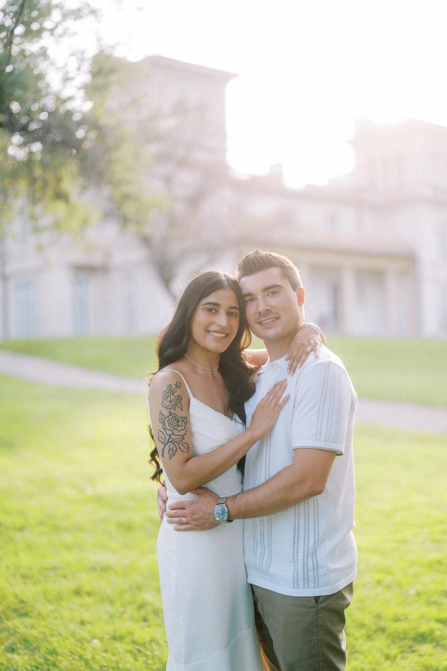 Sumbul and Brian embracing on the lawn at Dundurn Castle in Hamilton