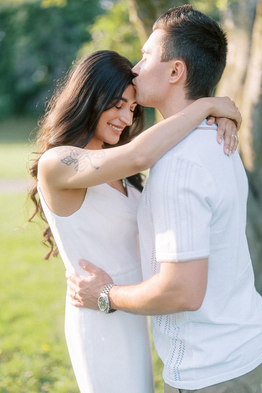 Sumbul and Brian embracing during their Dundurn Castle engagement photoshoot