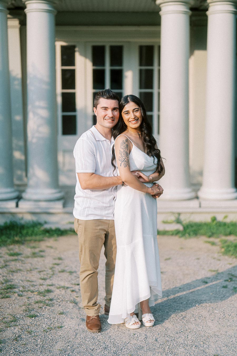 Sumbul and Brian posing by Dundurn Castle columns in Hamilton