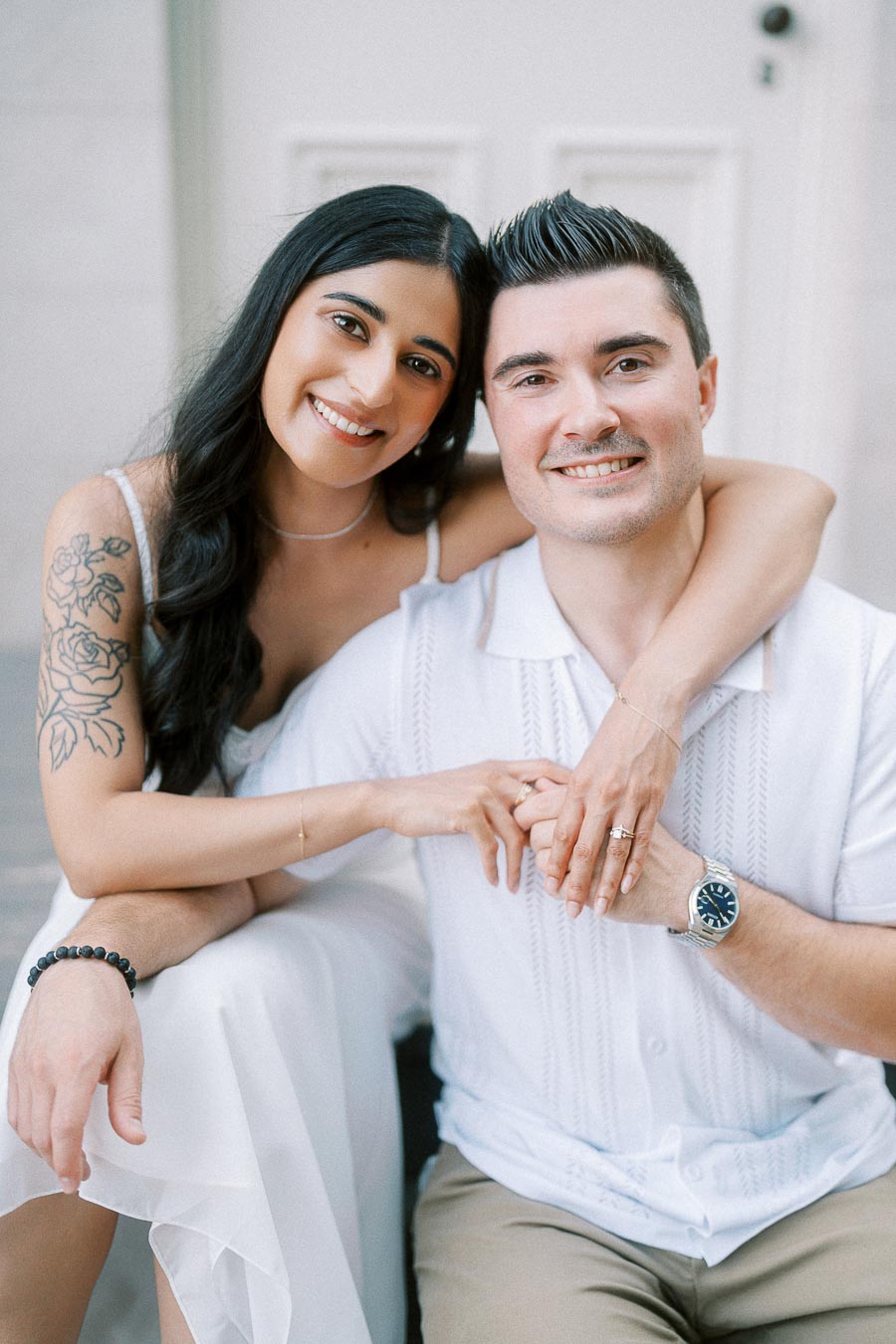 Sumbul and Brian smiling together during Dundurn Castle engagement photos