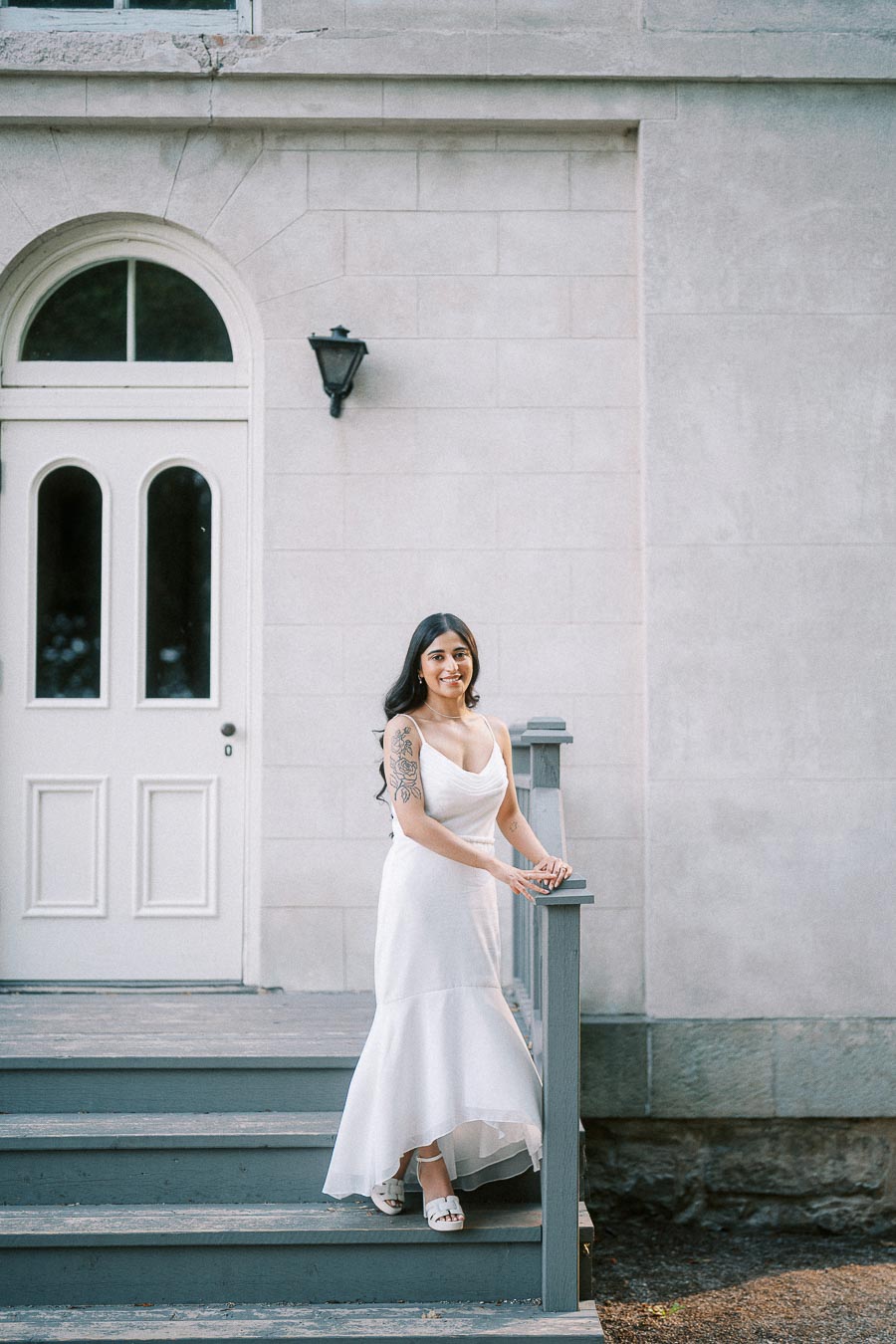 Bride-to-be posing on Dundurn Castle steps in Hamilton