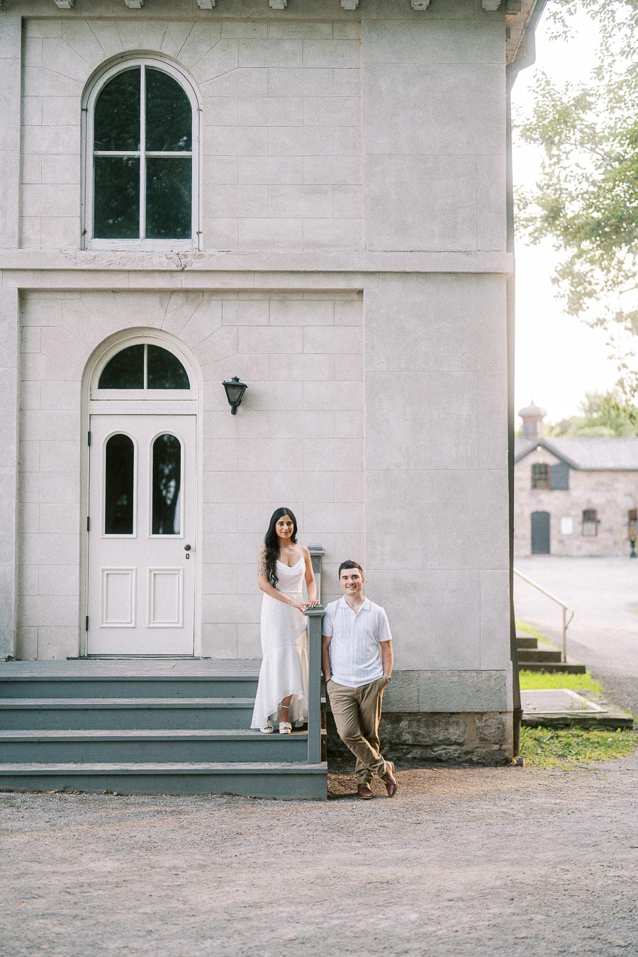 Sumbul and Brian posing by Dundurn Castle doorway in Hamilton
