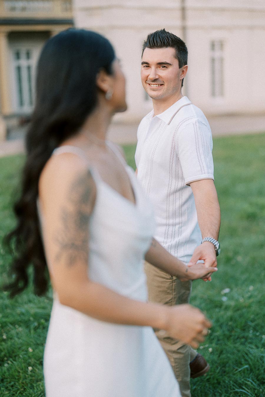 Groom-to-be smiling at partner during Dundurn Castle engagement session