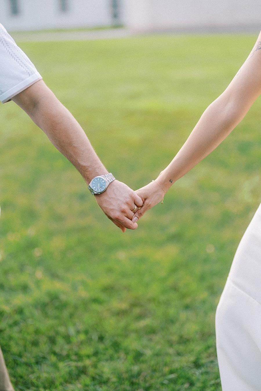 Sumbul and Brian holding hands during Dundurn Castle engagement photos