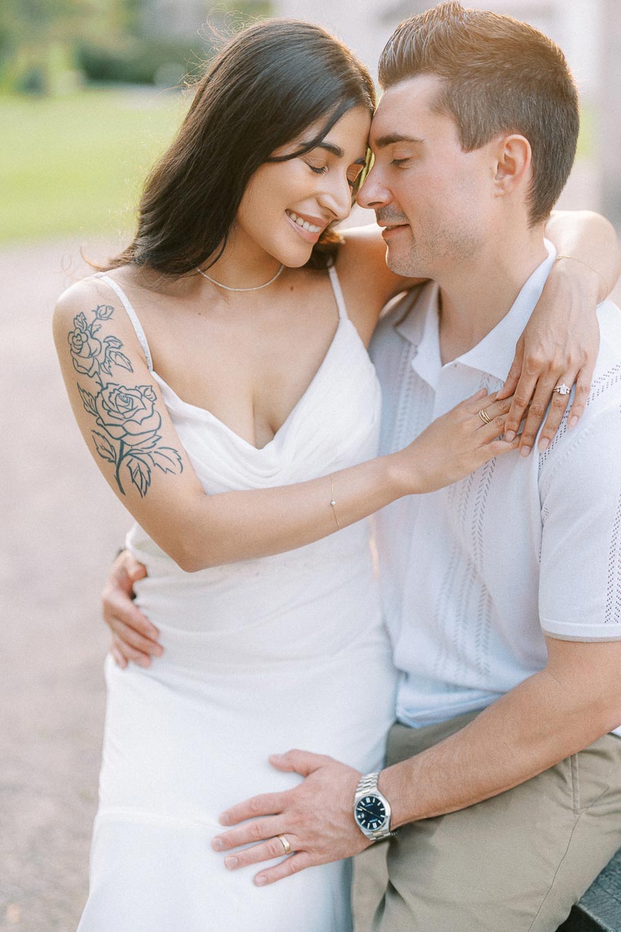 Sumbul and Brian cuddling during their Dundurn Castle engagement photoshoot