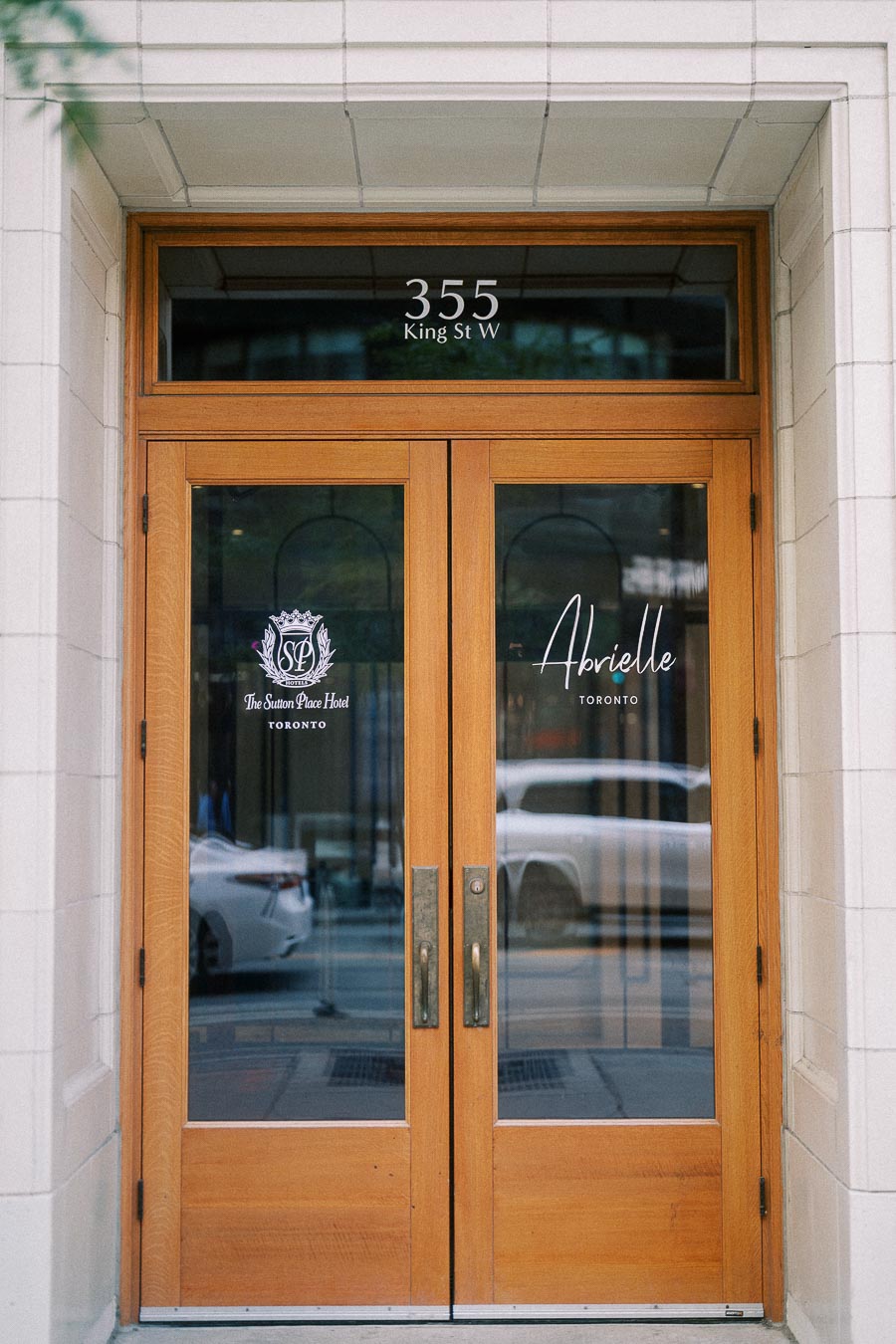 Wooden entrance doors for Abrielle Toronto at 355 King Street West